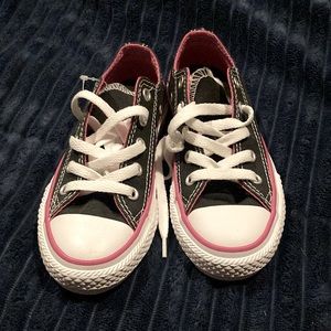 Converse All-Star Girls size 12. My daughter just went from Junior 11 to youth 1